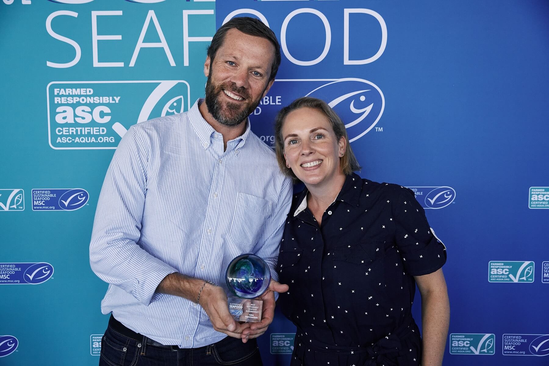 Bill Wall and Tillie Priestley from Coles picking up their award for the MSC's Best Sustainable Seafood Supermarket 2024