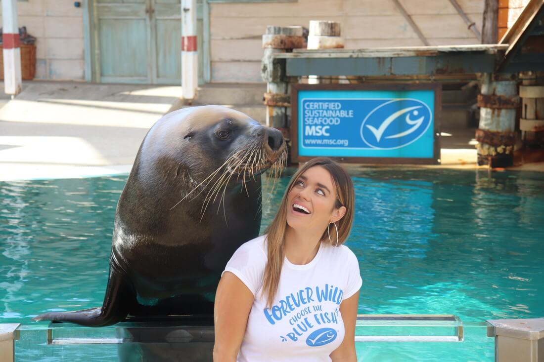 Laura Wells promoting the MSC blue fish tick at Taronga Zoo