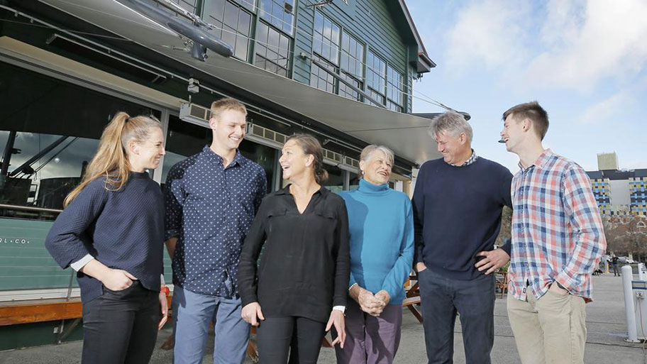 Mure family in front of Mure Fish Centre