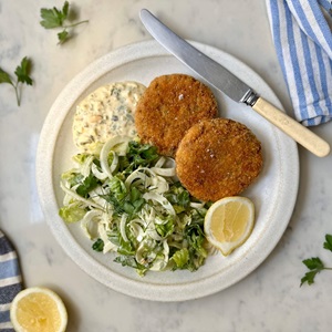 Wild crispy fish cakes with lemon, dill and chopped egg sauce