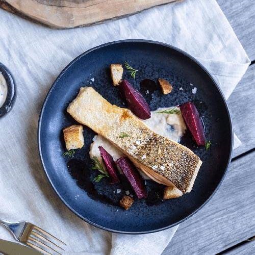 Wild crispy skin salmon with white bean and coriander puree