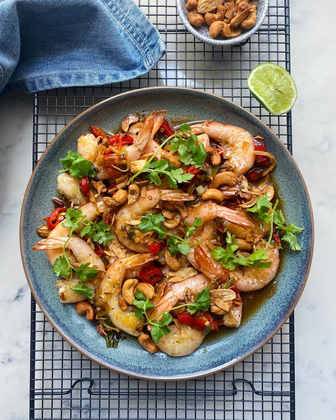 Wild grilled prawns with charred chilli dressing and crispy cashews Wild grilled prawns with charred chilli dressing and crispy cashews