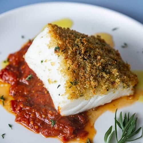 Wild herb crusted toothfish with roast tomato sauce