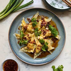 Wild prawn dumplings with chilli oil dressing