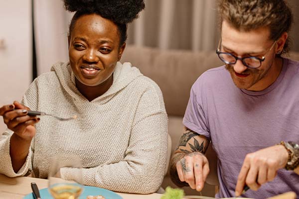 People eating dinner at the table