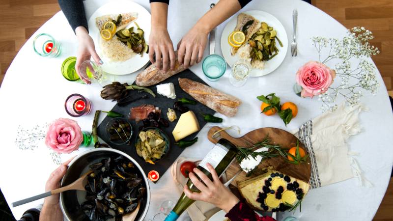 people sharing food at a table