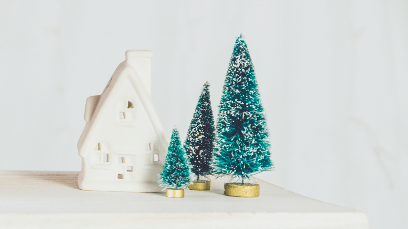 toy christmas tree and house shaped candle holder