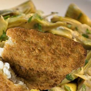 Filetti di merluzzo dorati con carciofi