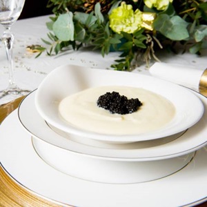 Crema de coliflor con perlas de arenque ahumado