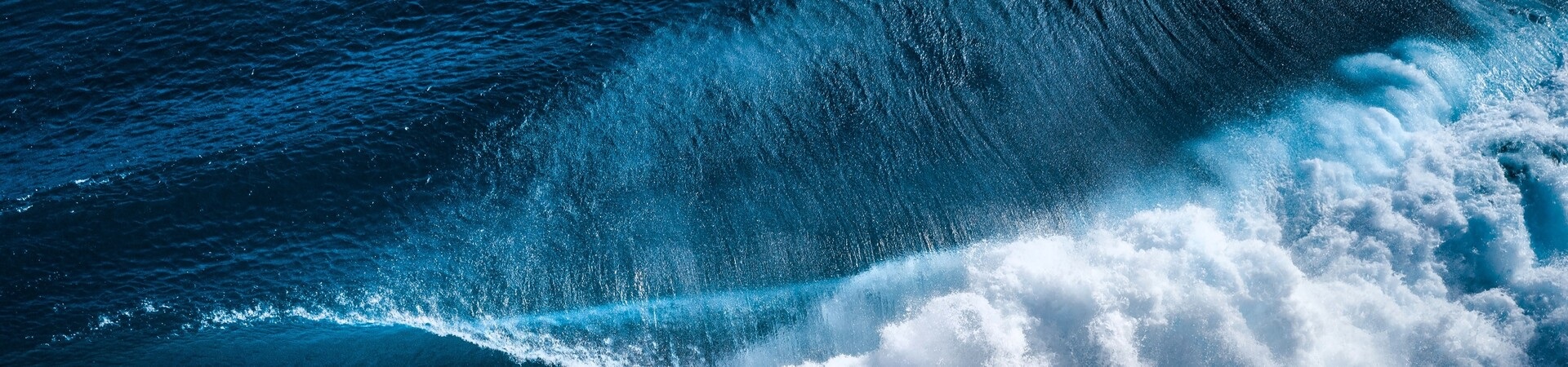 Bird's eye view of breaking ocean wave