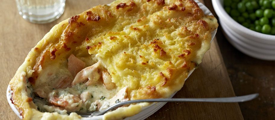 Fish pie in small dish with fork