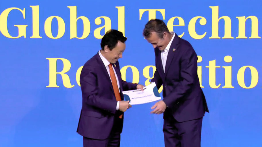 MSC CEO Rupert Howes receives recognition certificate from FAO Director-General QU Dongyu, FAO