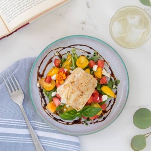 Alaska pollock with watermelon-strawberry bruschetta