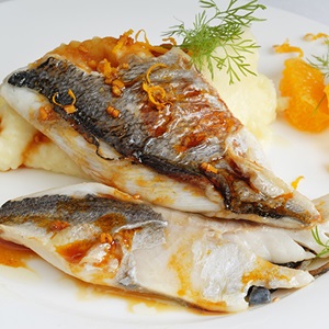 Hake fillet with saffron and orange sauce