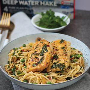 Pan-fried lemon & herb Cape hake with egg noodle stir-fry