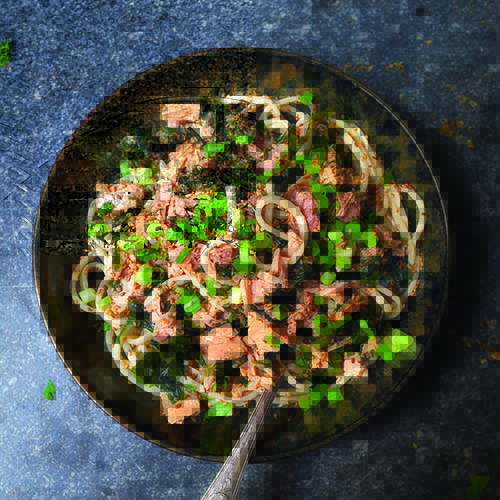 Tuna noodle salad served in a bowl