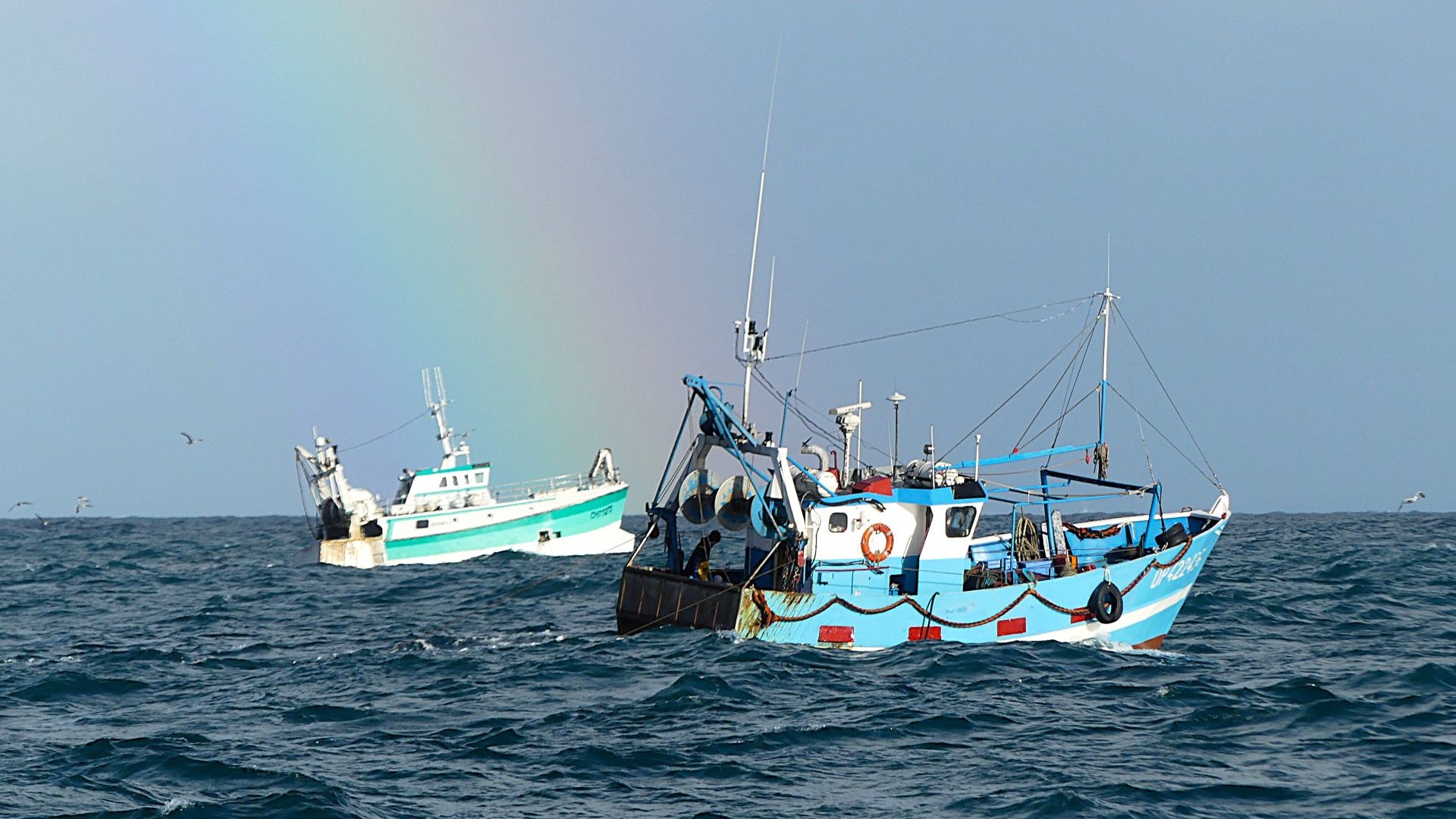 Baie de Seine scallop vessels_1920x1080 Baie de Seine scallop vessels at sea with rainbow
