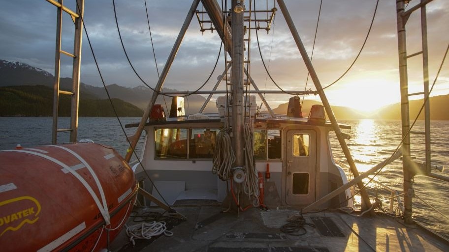 BC halibut vessel at sea during sunset