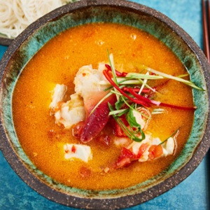 Chinese seafood and tomato hotpot