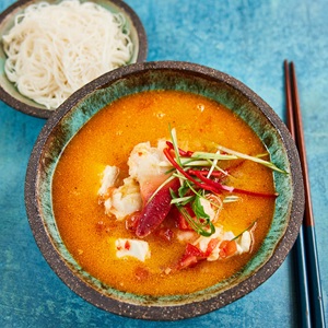 Chinese seafood and tomato hotpot