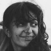 Black and white portrait photo of Nicola Tsiolis