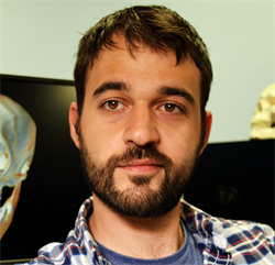 A headshot of a man
