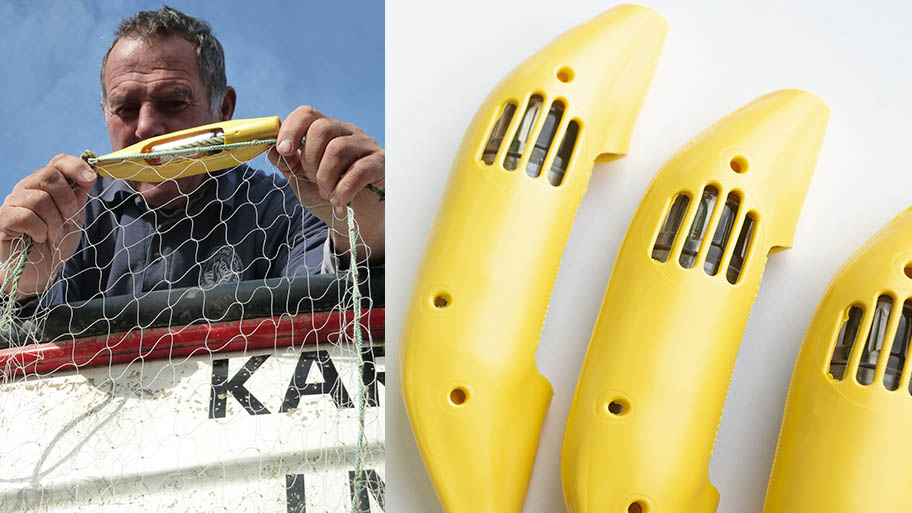 Fisherman holding Banana Pinger on net developed by FishTek Marine Ltd. 