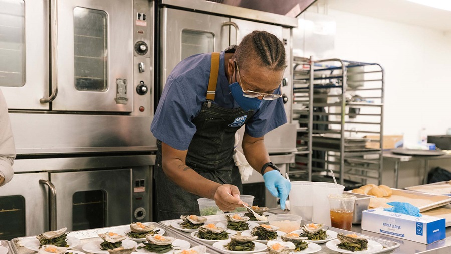 Image of Chef Gregory Gourdet cooking