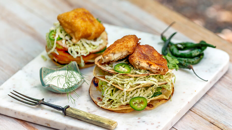 fish tacos on cutting board