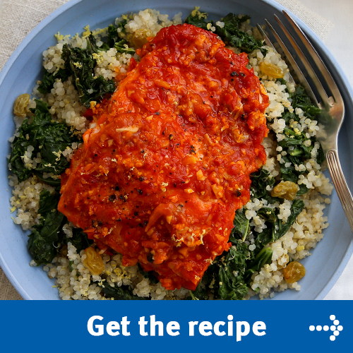 Harissa Baked Salmon over bed of lemon quinoa and kale