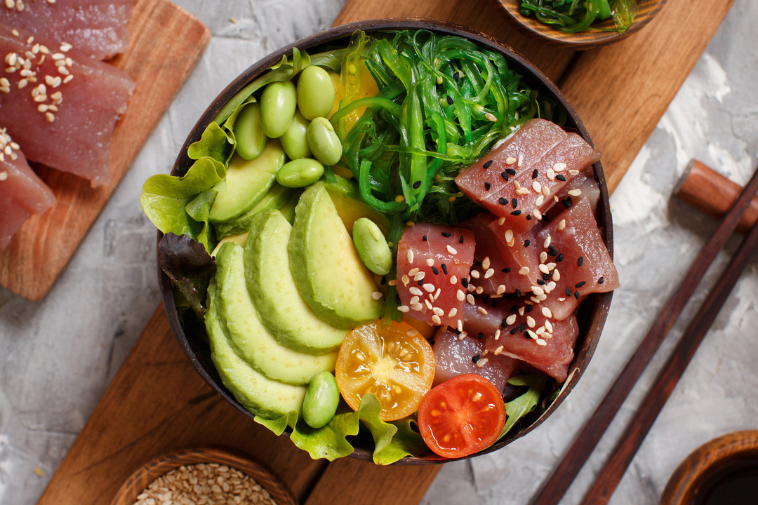 tuna poke Tuna poke bowl with tomatoes and avocado
