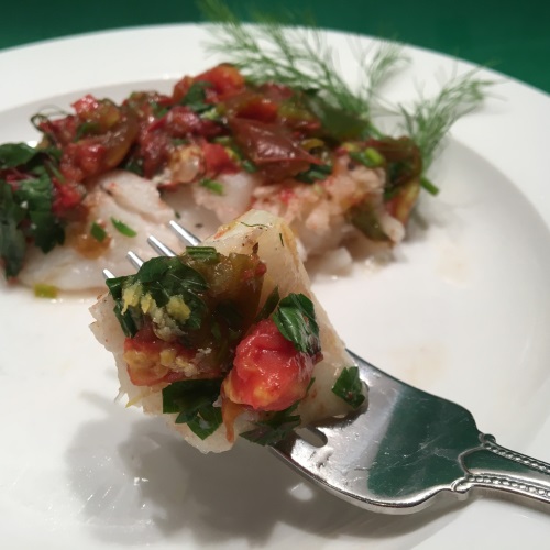 Wild Alaskan cod with fresh herbs and tomatoes