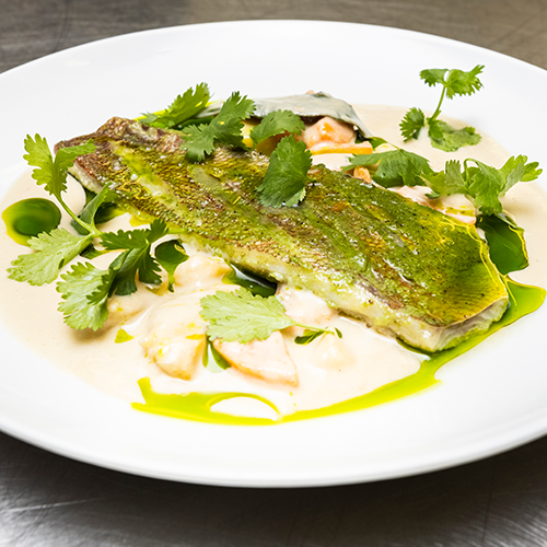 skin on rockfish in coconut broth with plantain and bay