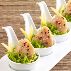 Whole ocean clams with seaweed salad