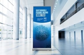 A world ocean day poster for the MSC on a stand