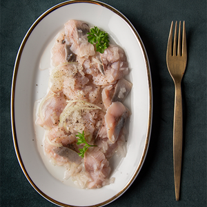 Śledź z cebulą w oliwie Jakuba Porady