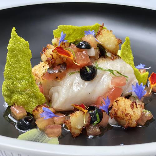 MSC Certified New Zealand Rockling fish with avocado purée, crispy potato, grilled baby leeks & Sauce Vierge
