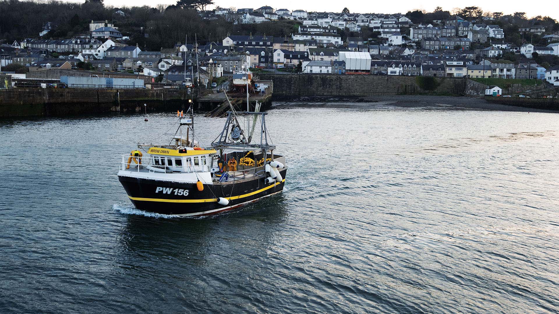Cornish sardine fishing boat at sunset