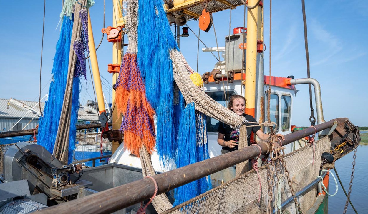 Fisherman Catherine Cook on board her vessel 'Two Marks'