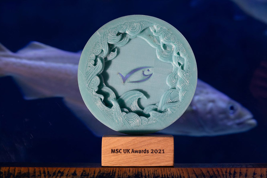 MSC 2021 award trophy with fish in background