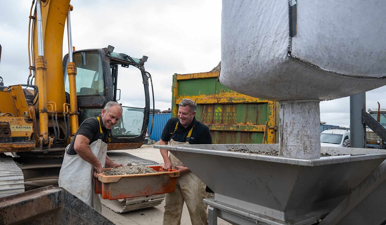 Andrew and Graham lifting cockles