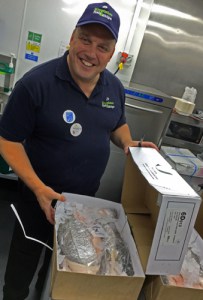 Craig Maw, owner of Kingfisher Fish and Chips receiving his delivery of Cornish hake