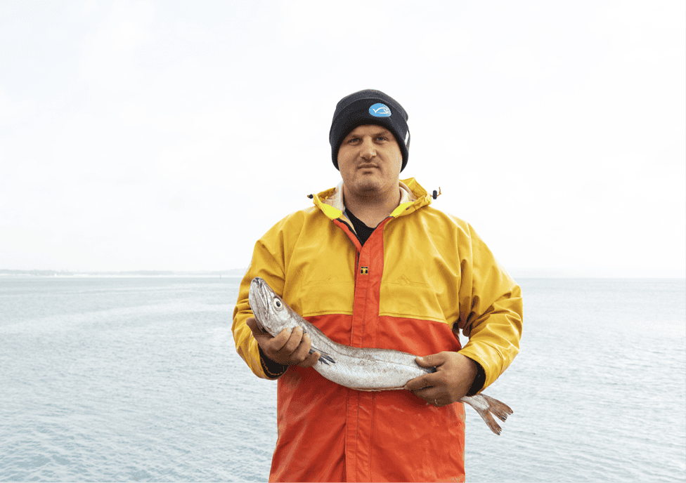 Ryan Davey holding a hake