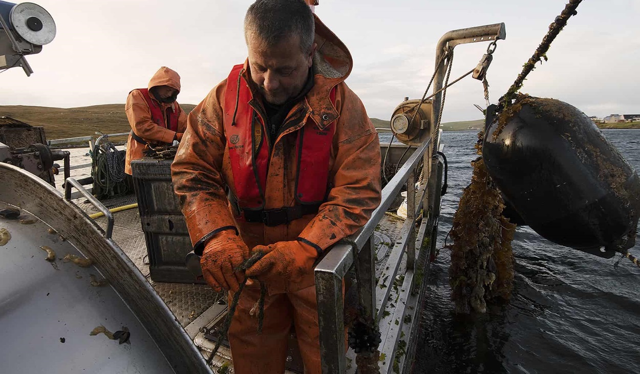 Scottish mussel fishermen on boat